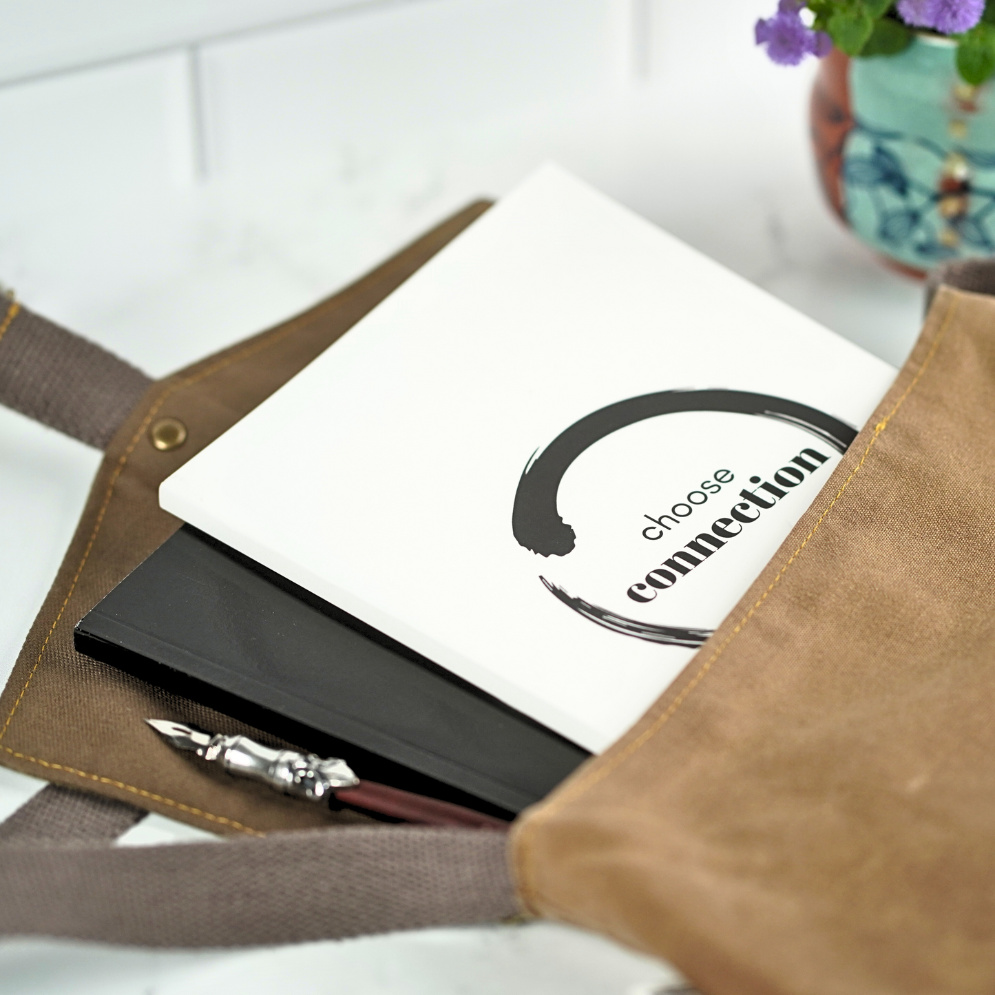 The Choose Connection affirmation journal by Treesnail Wellness come in either a black or white cover choice.