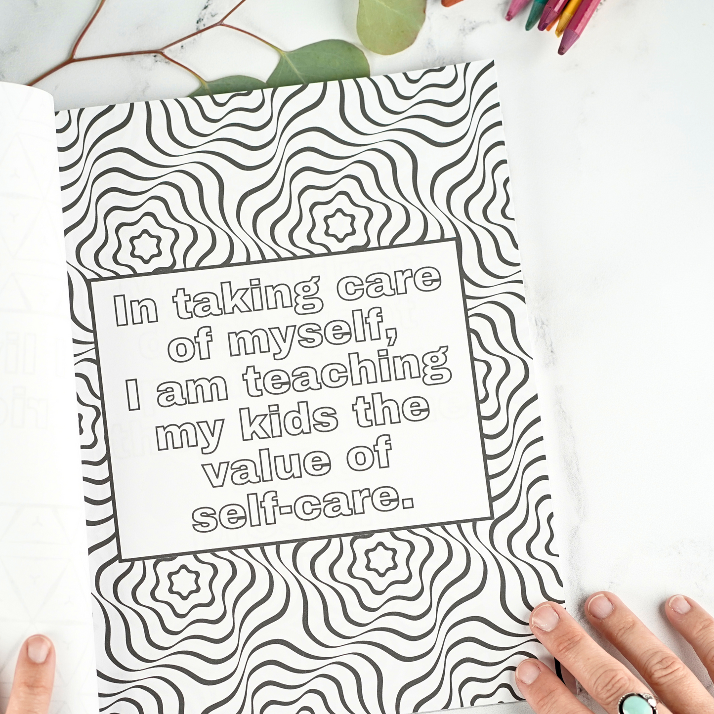 Example 3 inside the Parents Affirmation Coloring Book: "In taking care of myself, I am teaching my kids the value of self-care."