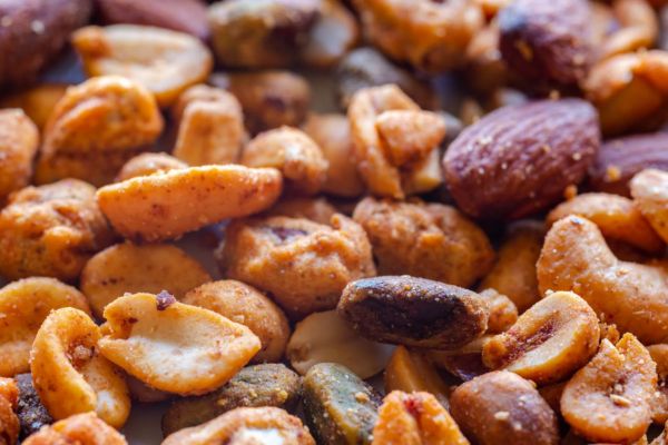 almonds, peanuts, and other nuts with spices on top