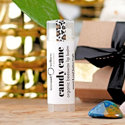 Candy Cane holiday lip balm .15 oz plastic twist-up—peppermint + vanilla, seasonal Oct–Dec