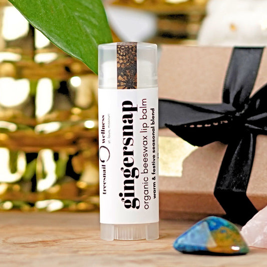 Gingersnap organic lip balm in .15 oz twist up tube by Treesnail Wellness