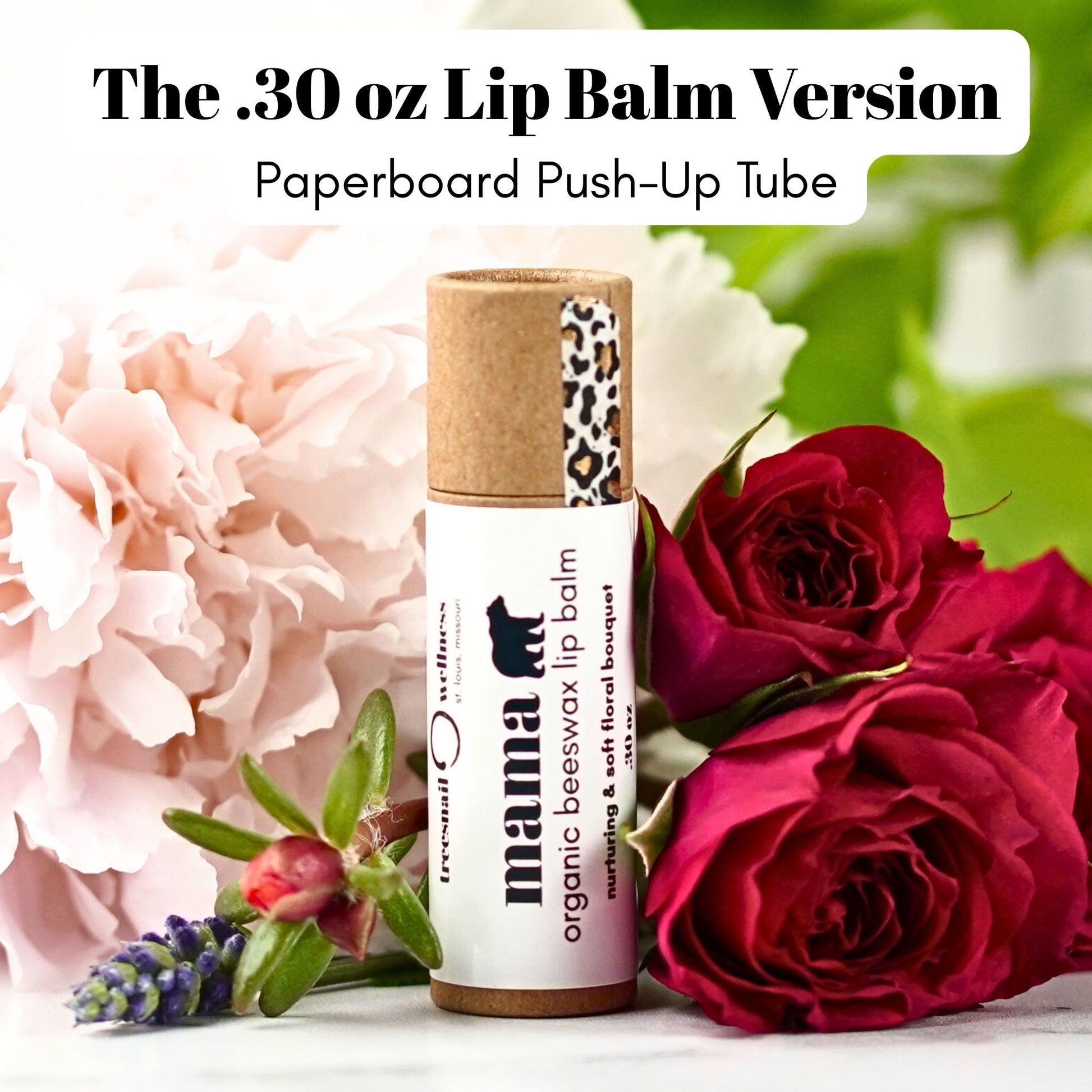 Paperboard Lip balm with leopard print cap on a white background with flowers with Mama Bear organic beeswax lip balm label.