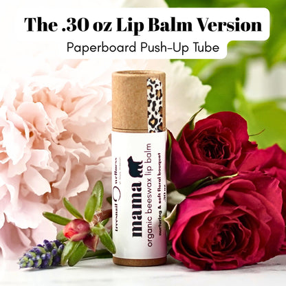 Paperboard Lip balm with leopard print cap on a white background with flowers with Mama Bear organic beeswax lip balm label.