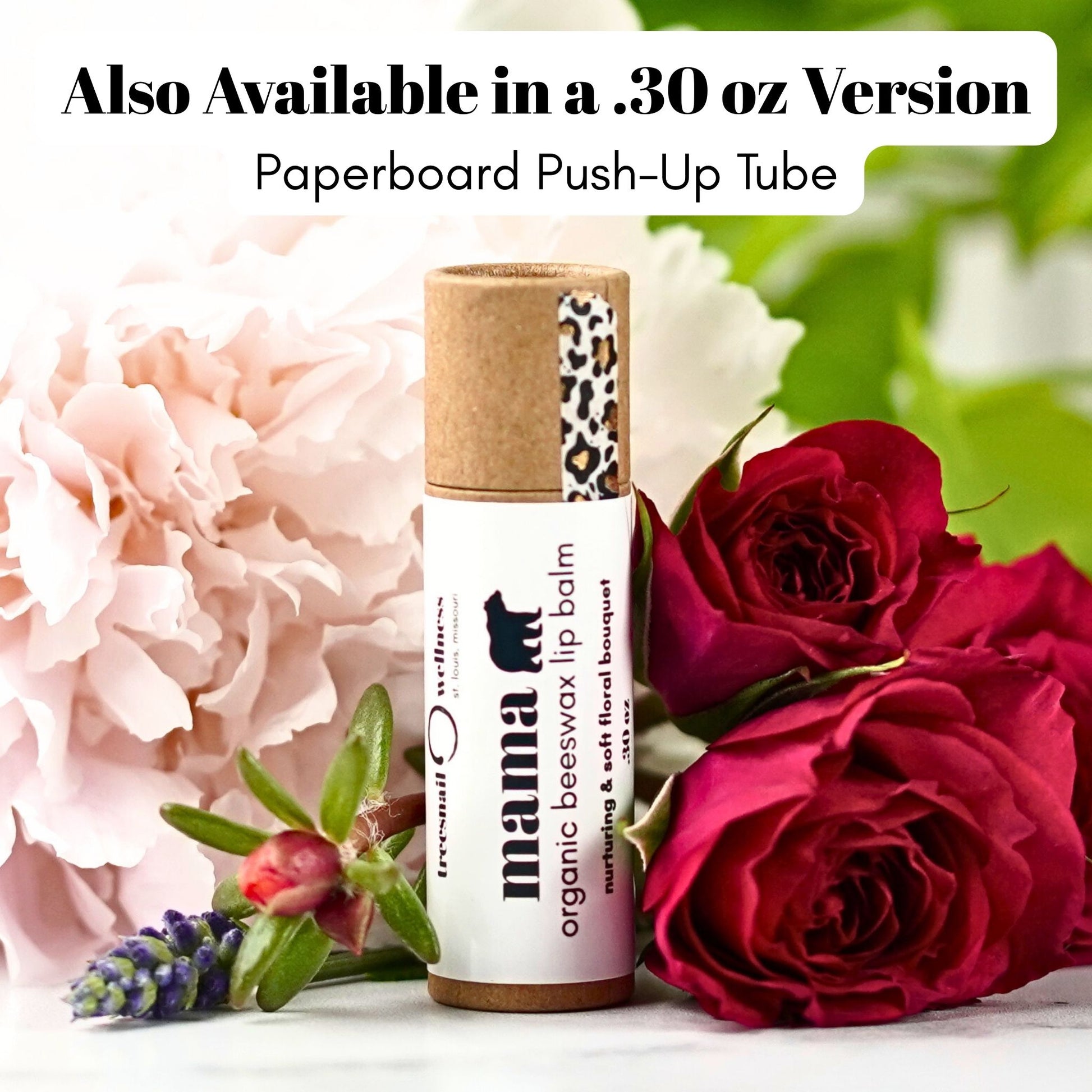 Lip balm with a paperboard push-up tube surrounded by flowers and roses.