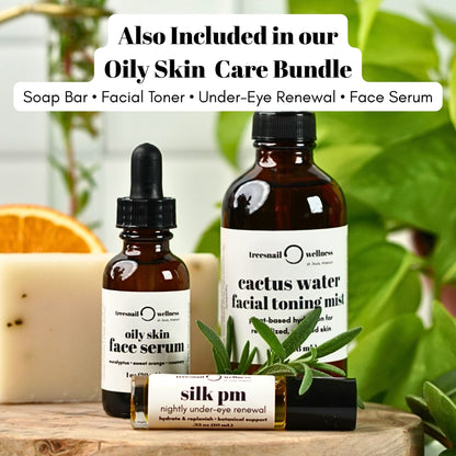 Oily skin care products including a serum, toner, and renewal product with a plant and orange slice in the background.