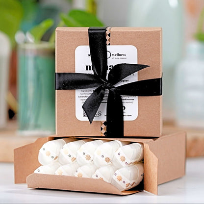 Square box of 10 organic lip balms .15 oz—ribbon-tied paperboard gift box, assorted essential-oil scents