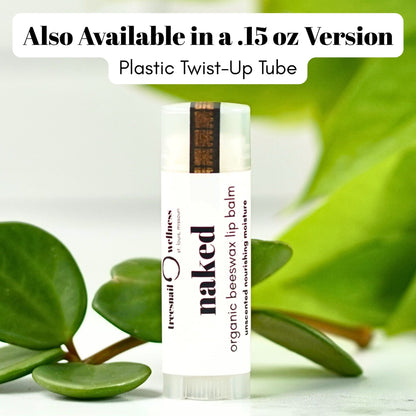 Fragrance Free Lip balm tube with green leaves in the background