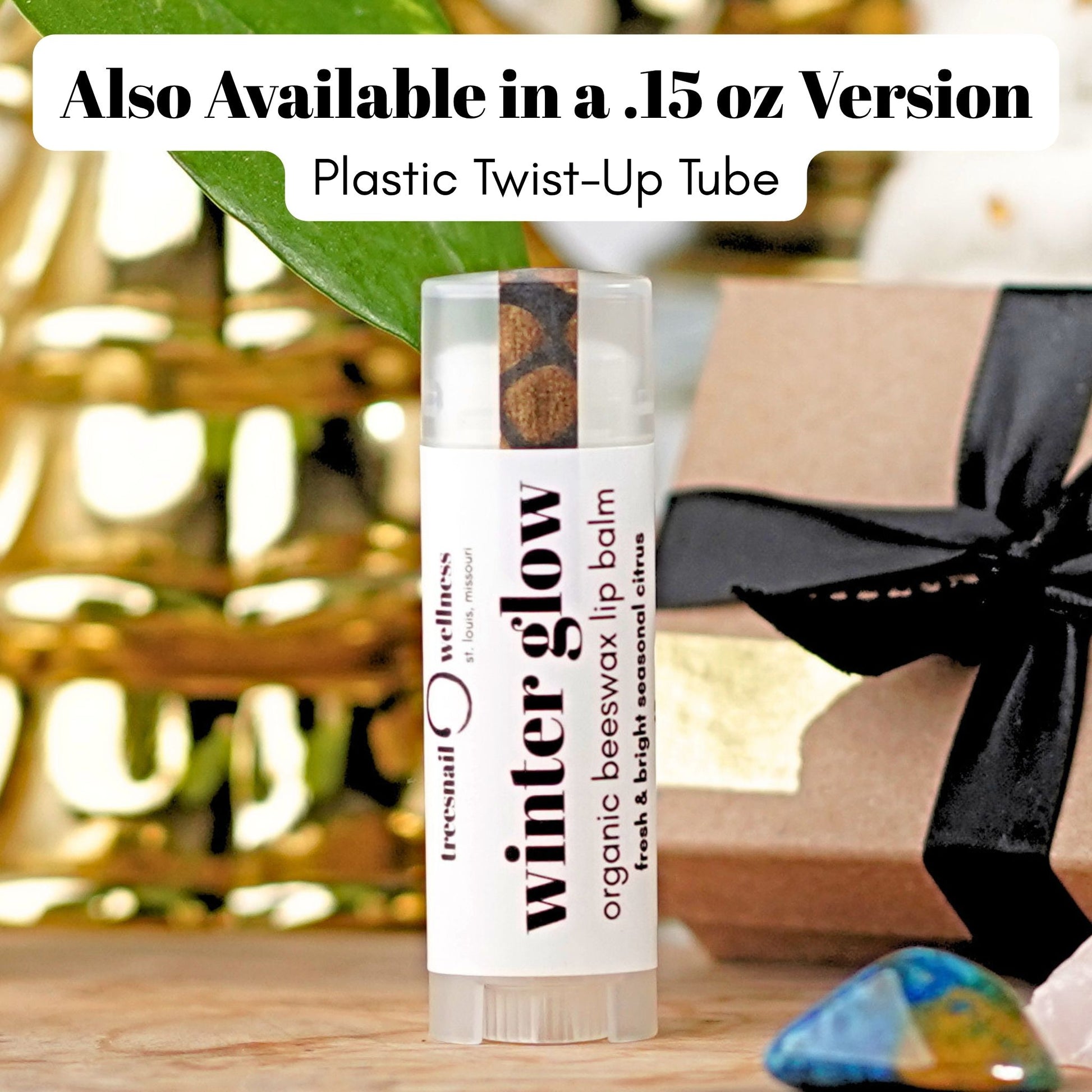 Winter Glow natural lip balm .15 oz plastic twist-up—grapefruit, orange, frankincense, balsam fir, ginger (seasonal Oct–Dec)