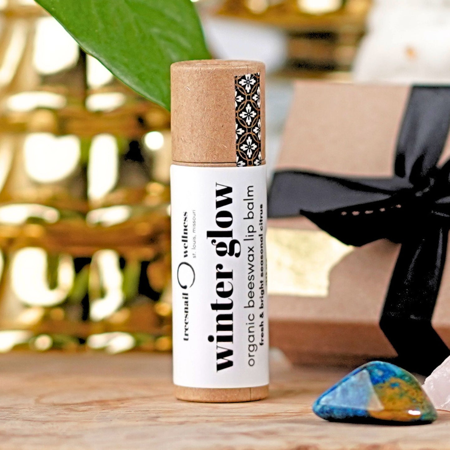 Winter Glow organic beeswax lip balm in a sustainable .30 oz tube by Treesnail Wellness